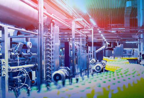 A large industrial machine room with many machines.