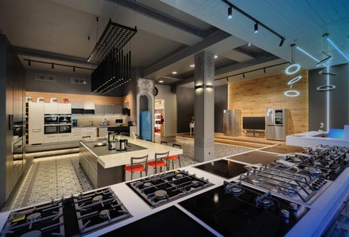 A kitchen with many appliances and furniture in it