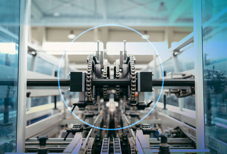 A machine that is in the middle of a factory.