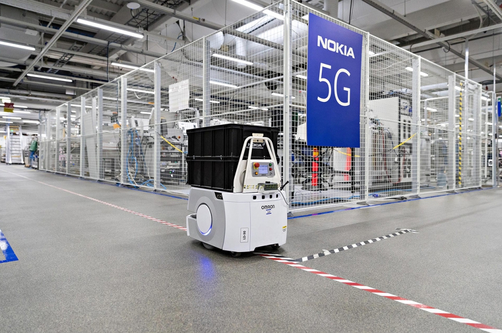 A robot is moving around in an industrial setting.