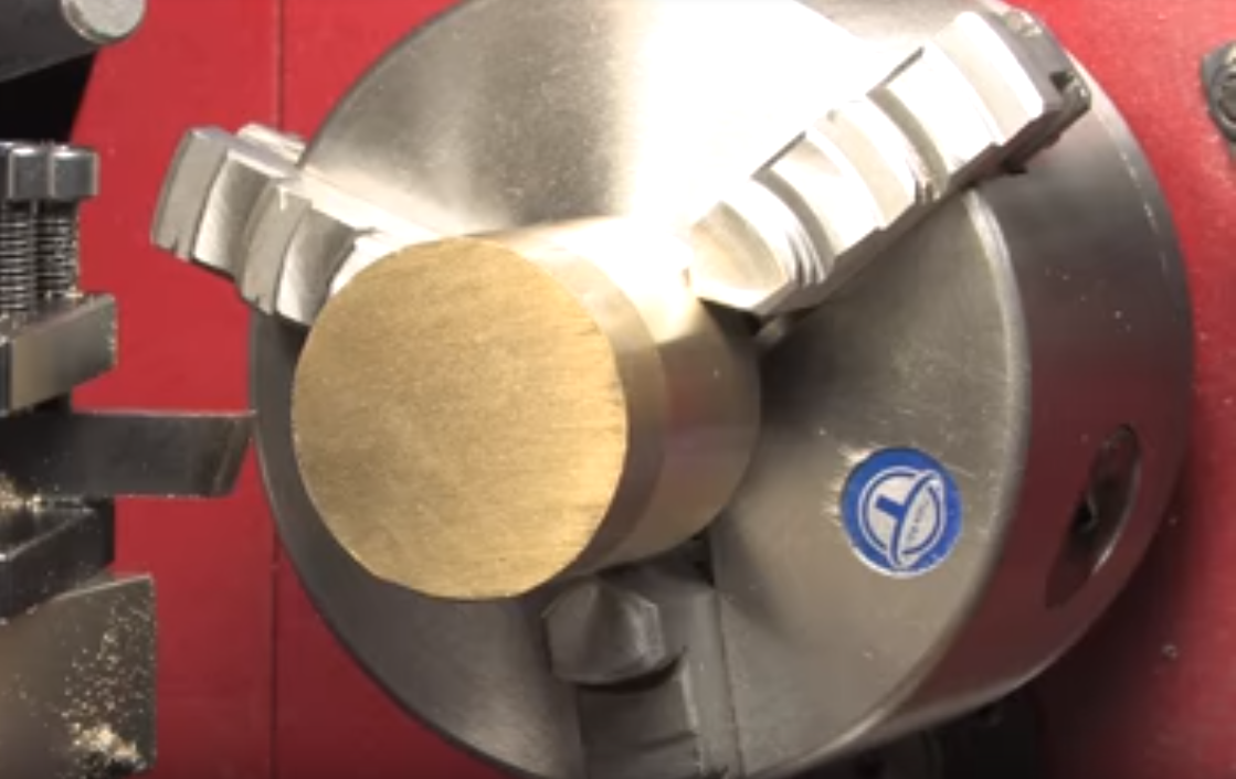 A close up of the bottom part of a machine